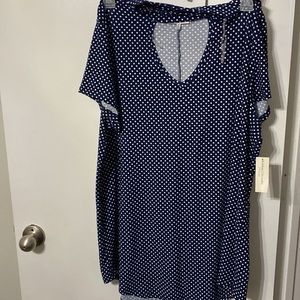 Navy blue Polk dot shirt with keyhole opening in the back